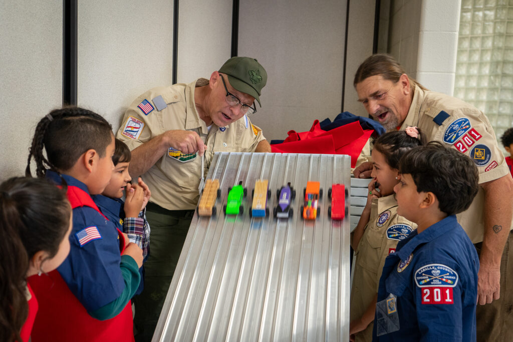  Jeff Smith and Thomas Hodges of the Boy Scouts of America, LaSalle Council work with students at Wilson Elementary School in South Bend, Ind.